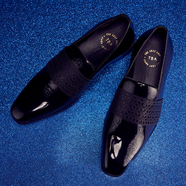 The Brat Army Montreux Patent Black Carved Strap Loafers.