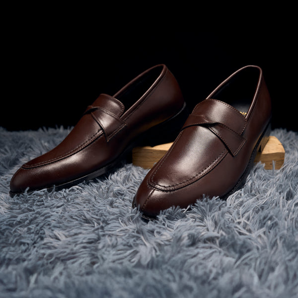 The Brat Army Derby Brown Twisted Strap Loafers.