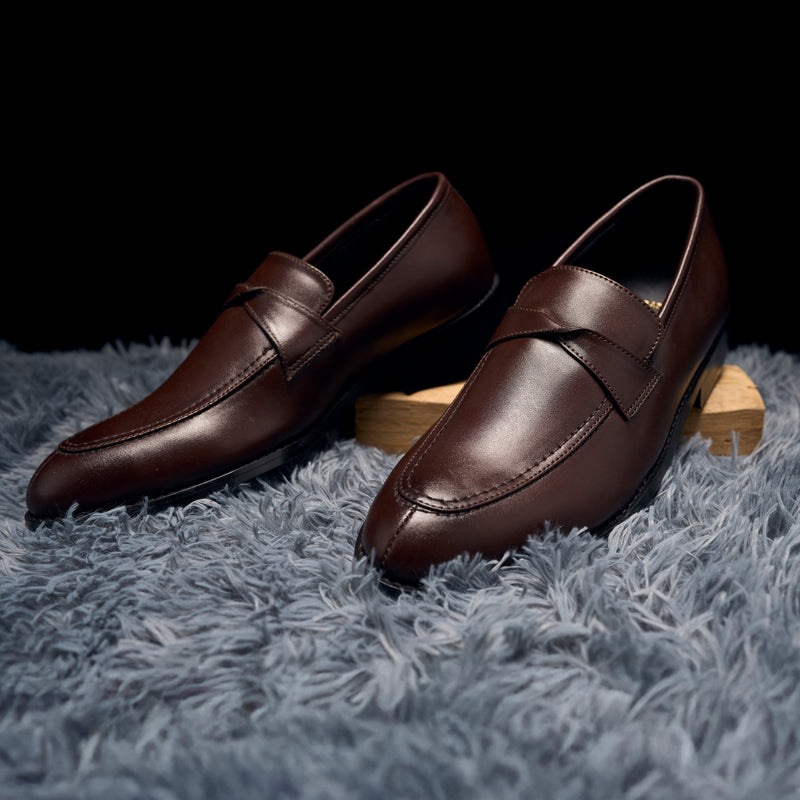 The Brat Army Derby Brown Twisted Strap Loafers.
